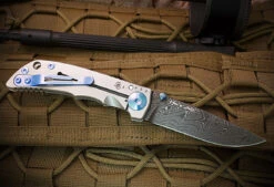 Spartan Blades Harsey Folder 3.25 Titanium / Blue 3.25" Nichols DamascusBlade SF10CNBL